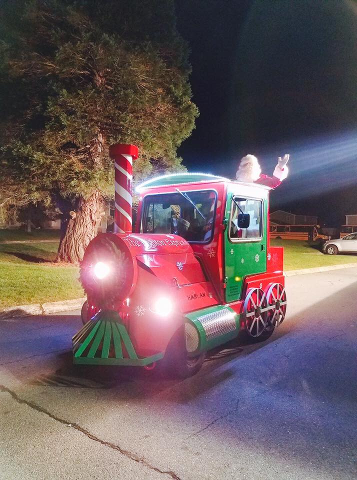 Christmas train driving through the street